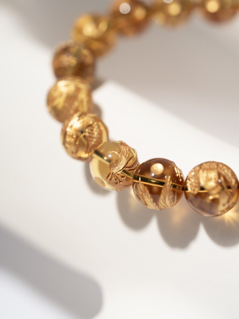 Natural Amber Bracelet Featuring Carved Golden Phoenix 10MM